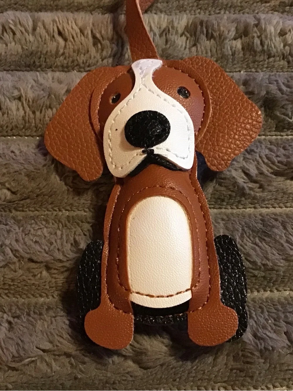 Brown and White Dog-Shaped Pet Tag or Accessory